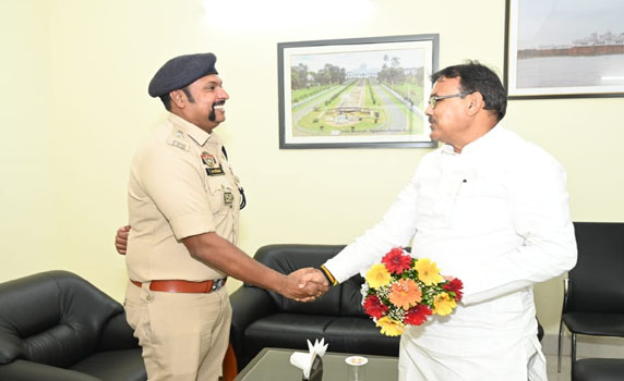 Tripura Finance minister Pranajit Singha Roy greets new SP Gomati Dr. Kiran Kumar K in Udaipur. 